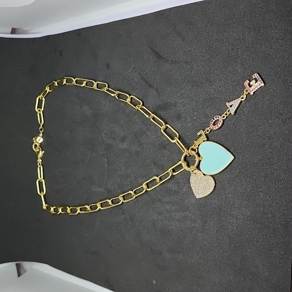 Ashley Gold Stainless Steel Gold Plated Triple Powder Blue Enamel Charm Necklace